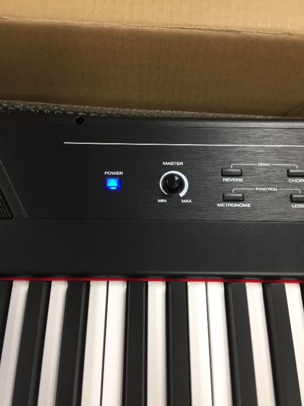 Photo 1 of Alesis Recital – 88 Key Digital Piano Keyboard with Semi Weighted Keys, 2x20W Speakers, 5 Voices, Split, Layer and Lesson Mode, FX and Piano Lessons