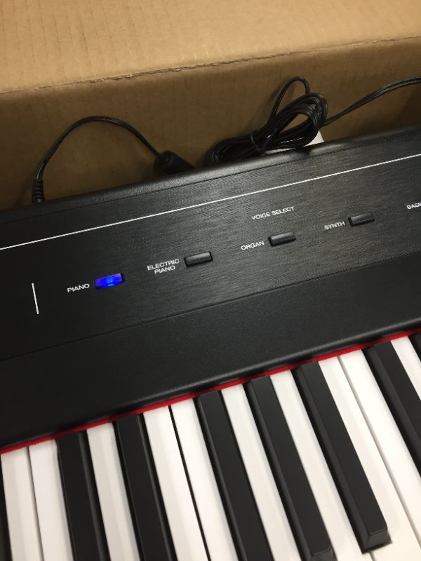 Photo 1 of Alesis Recital – 88 Key Digital Piano Keyboard with Semi Weighted Keys, 2x20W Speakers, 5 Voices, Split, Layer and Lesson Mode, FX and Piano Lessons