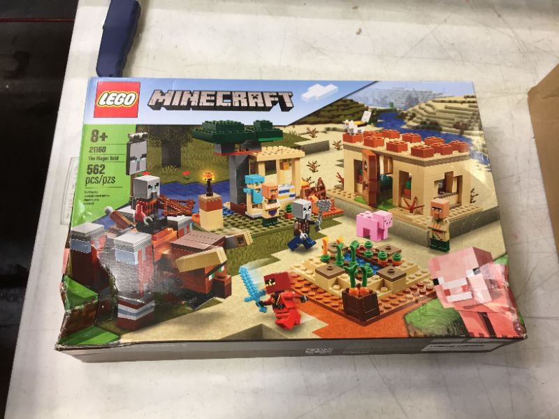 Photo 2 of LEGO Minecraft The Villager Raid 21160 Building Toy Action Playset for Boys and Girls Who Love Minecraft (562 Pieces)
