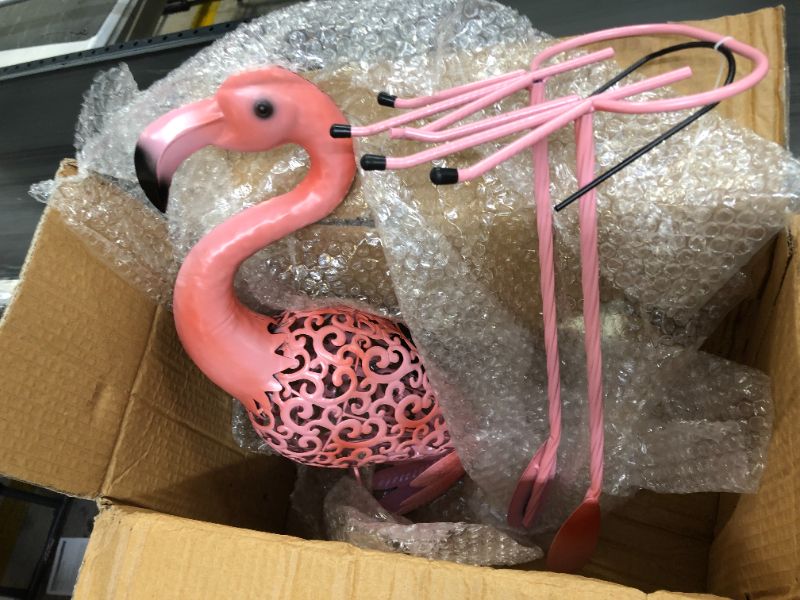 Photo 1 of 2 flamingo statue 