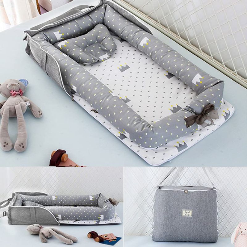 Photo 1 of Baby Lounger Nest Bassinet for Bed, Portable Baby Co-Sleeping Cribs & Cradles for Bedroom and Travel, 100% Soft Cotton Baby Bed (Crown Bag)
