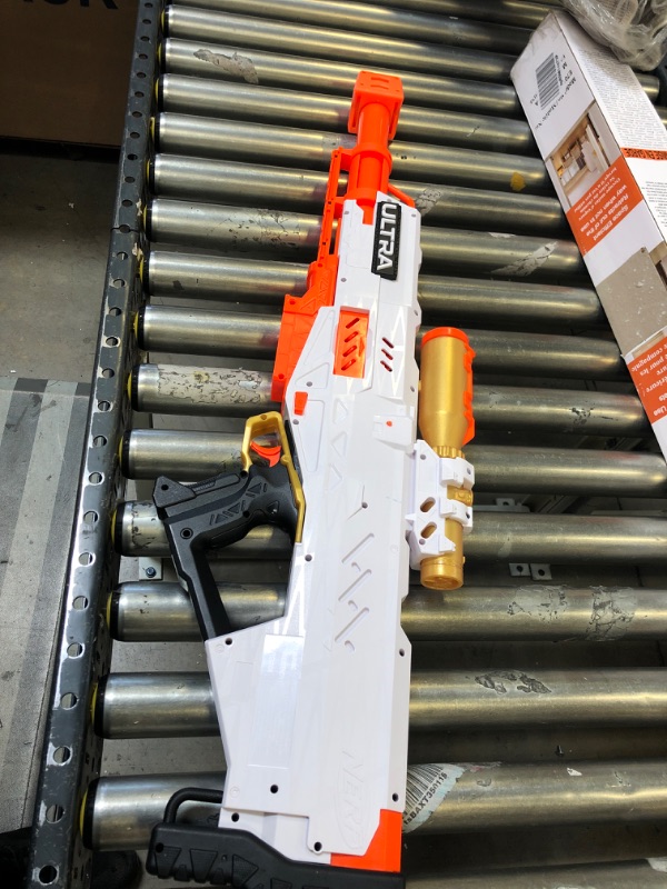 Photo 2 of Nerf Ultra Pharaoh Blaster with Premium Gold Accents, 10-Dart Clip, 10 Nerf Ultra Darts, Bolt Action, Compatible Only with Nerf Ultra Darts
