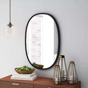 Photo 1 of 24 X 36 IN BLACK METAL ROUND PIVOT MIRROR 