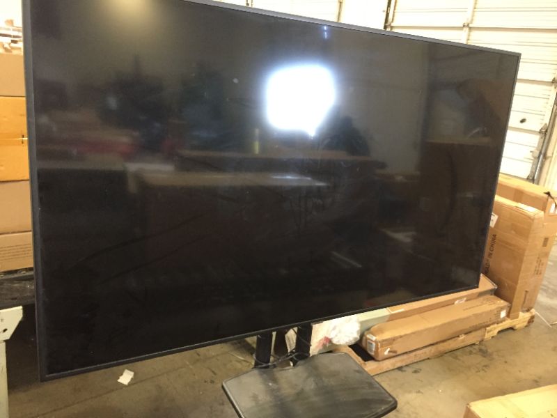 Photo 1 of Samsung Professional HG65NJ690UFXZA 65" SMART UHD Hospitality TV ON ROLLERS. INCLUDES ONLY POWER CABLE, TV AND ROLLING CART. FUNCTIONS FINE JUST VERY DIRTY/DUSTY