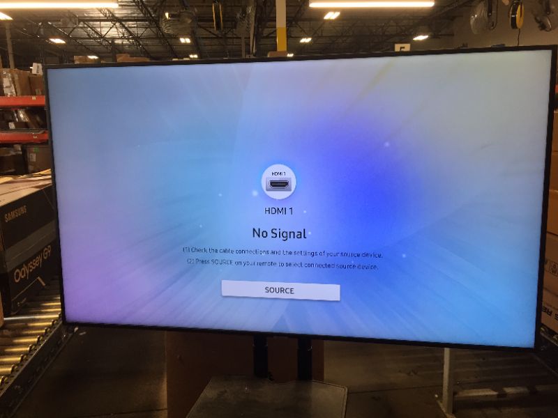 Photo 1 of Samsung Professional HG65NJ690UFXZA 65" SMART UHD Hospitality TV ON ROLLERS. INCLUDES ONLY POWER CABLE, TV AND ROLLING CART. FUNCTIONS FINE JUST VERY DIRTY/DUSTY