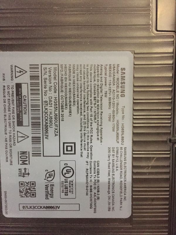 Photo 1 of Samsung Professional HG65NJ690UFXZA 65" SMART UHD Hospitality TV ON ROLLERS. INCLUDES ONLY POWER CABLE, TV AND ROLLING CART. FUNCTIONS FINE JUST VERY DIRTY/DUSTY