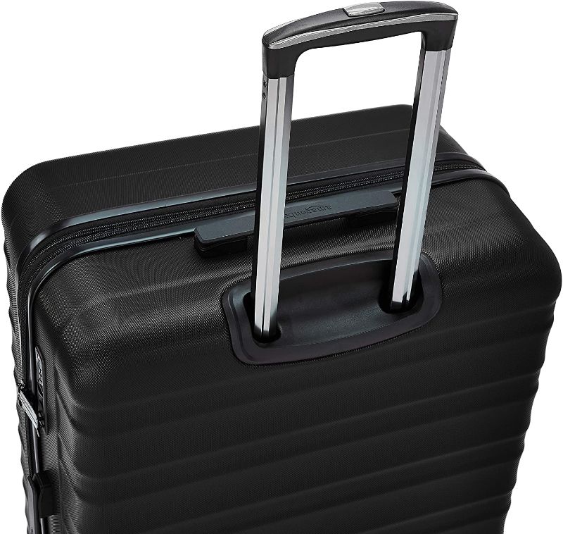 Photo 1 of Amazon Basics Hardside Spinner Suitcase Luggage with Wheels - 28-Inch, Black
