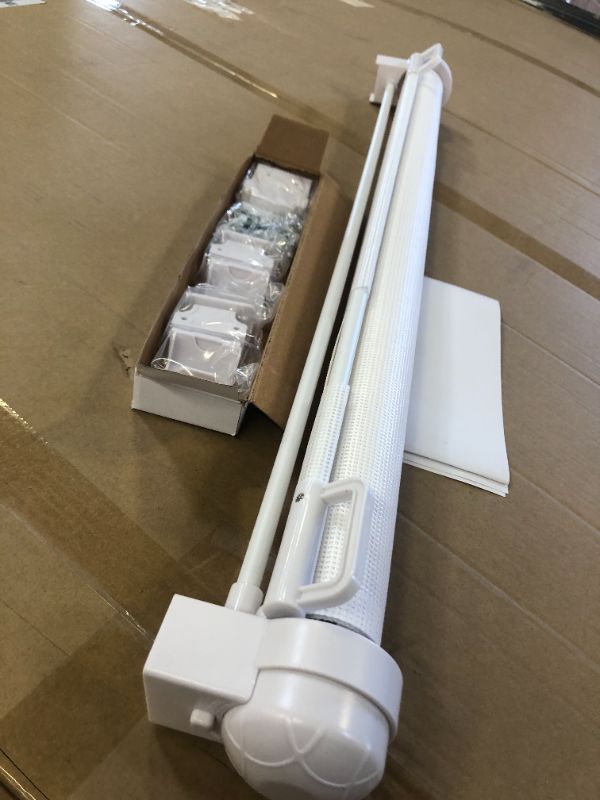Photo 1 of EasyBaby Products Extra Wide and Extra Tall Indoor Outdoor Retractable Baby Gate Extends up to 71" Wide, 39.3" (100cm) Tall, White
