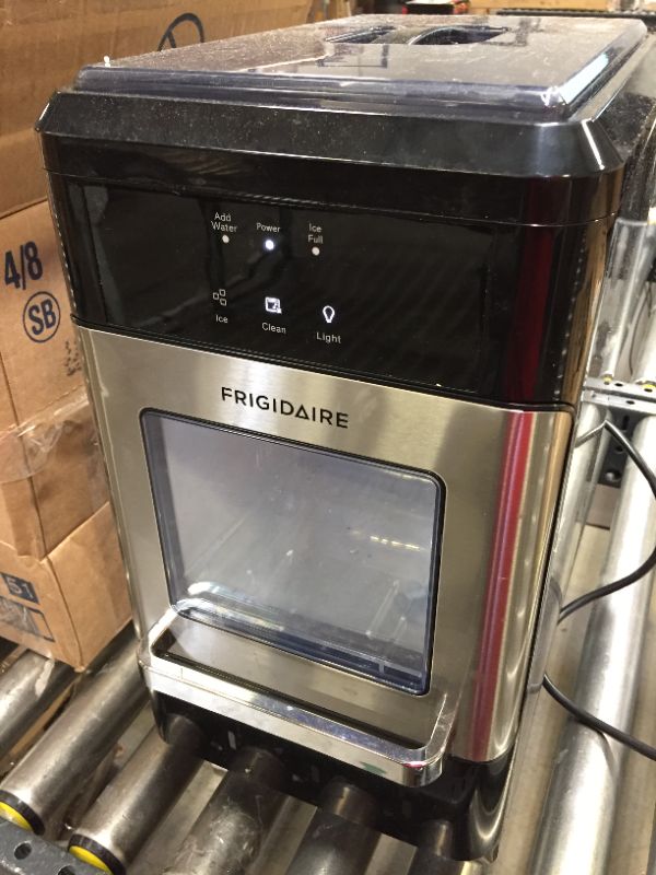 Photo 2 of Frigidare ice maker machine