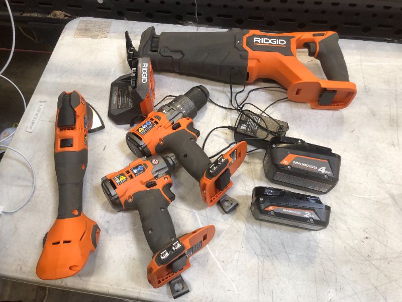 Photo 2 of 18V Brushless Cordless 4-Tool Combo Kit with (1) 4.0 Ah and (1) 2.0 Ah MAX Output Batteries, 18V Charger, and Tool Bag
