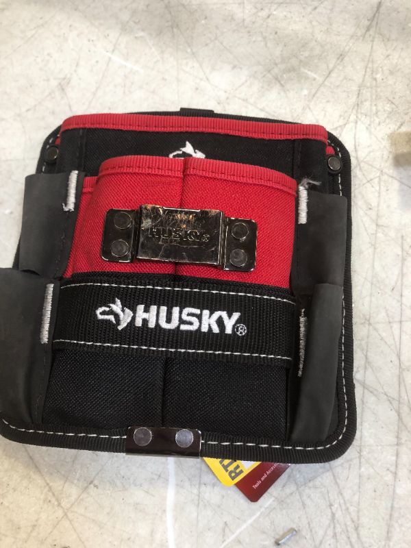 Photo 2 of Husky 7 in. 3-Pocket Clip On Tool Belt Pouch, Red/Black
