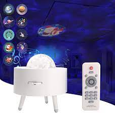 Photo 1 of Star Projector Night Light, Light up Ceiling with Ocean Wave, Bluetooth Music Speaker, Galaxy Projector LED Lamps with Christmas/Astronaut/Planet Projection, Gifts for Kids, Bedroom, Party(White)
