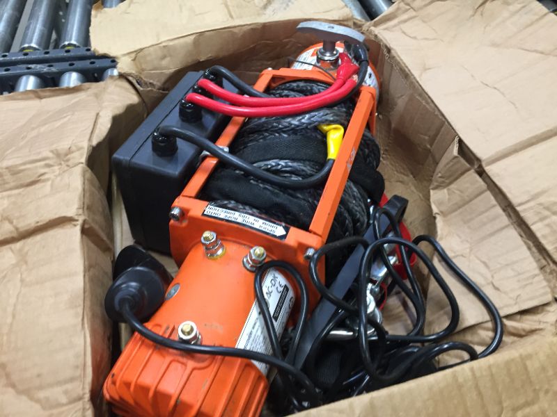 Photo 5 of AC-DK 13500 lbs Electric Winch 12V DC Water Proof IP67 Recovery Winch with Synthetic Rope Orange Color Come with Overload Protection Winch Dust Cover and 2 Wireless Remotes
