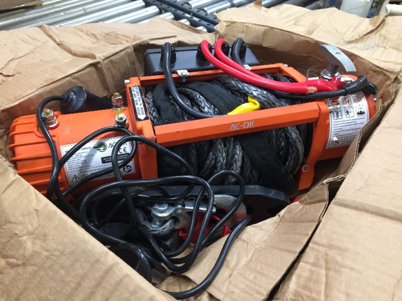 Photo 3 of AC-DK 13500 lbs Electric Winch 12V DC Water Proof IP67 Recovery Winch with Synthetic Rope Orange Color Come with Overload Protection Winch Dust Cover and 2 Wireless Remotes
