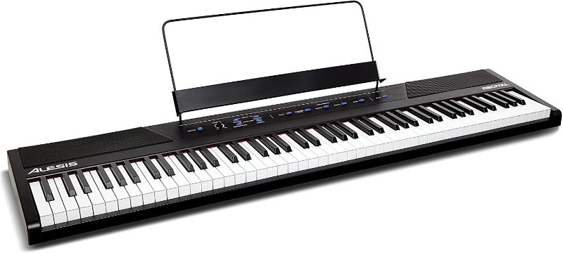 Photo 1 of Alesis Recital – 88 Key Digital Piano Keyboard with Semi Weighted Keys, 2x20W Speakers, 5 Voices, Split, Layer and Lesson Mode, FX and Piano Lessons
