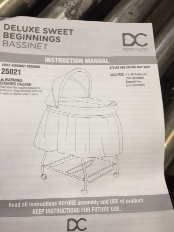 Photo 1 of Delta Children Deluxe Sweet Beginnings Bedside Bassinet - Portable Crib with Lights and Sounds, Falling Leaves
