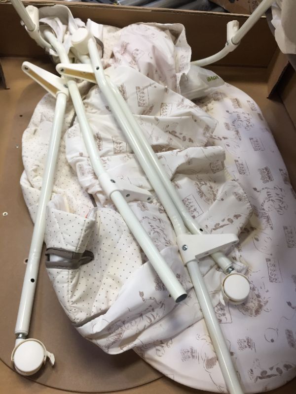 Photo 1 of Delta Children Deluxe Sweet Beginnings Bedside Bassinet - Portable Crib with Lights and Sounds, Falling Leaves
