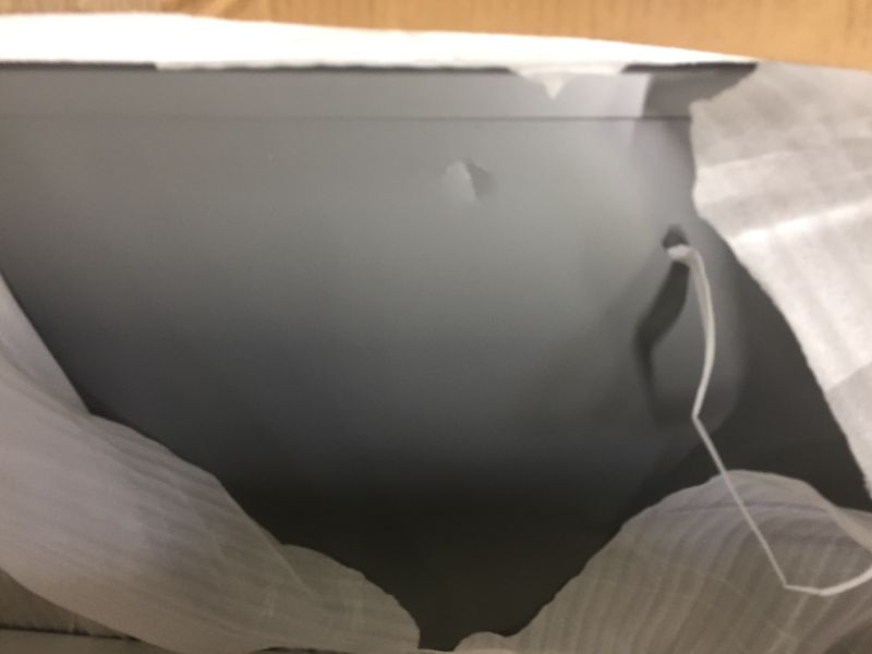 Photo 1 of Davinci Archie Portable Bassinet in Gray