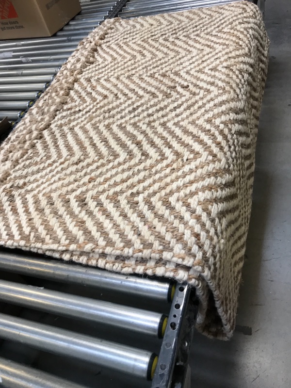 Photo 1 of 5FT X 8FT KNITTED CARPET 