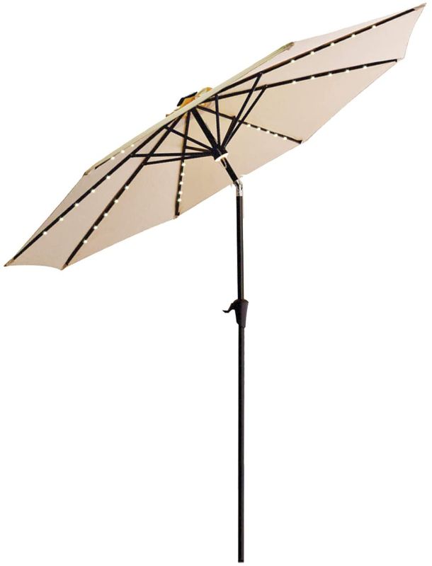 Photo 1 of FLAME&SHADE 11 ft Solar Powered Outdoor Market Patio Table Umbrella with LED Lights and Tilt, Beige
