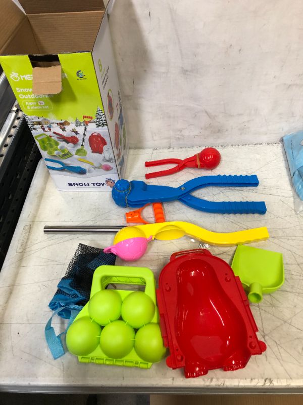 Photo 1 of Farsaw Snowball Maker Toy Set for Kids, 7 PCS Snow Toy Mold Kits with Snow Shovels Storage Bag for Winter Outdoor Snowball Fight Games