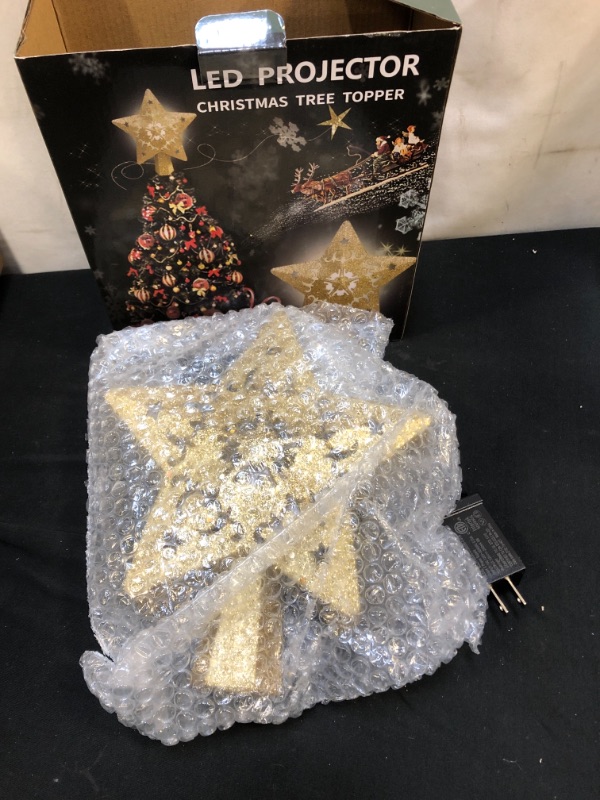 Photo 2 of ACMETOP Gold Star Christmas Tree Topper, Christmas Tree Star Topper with Rotating LED Snowflake Projector Light, Perfect for Christmas Tree Decoration, Home Decoration, Ideal Gifts (2021 Upgrade)
