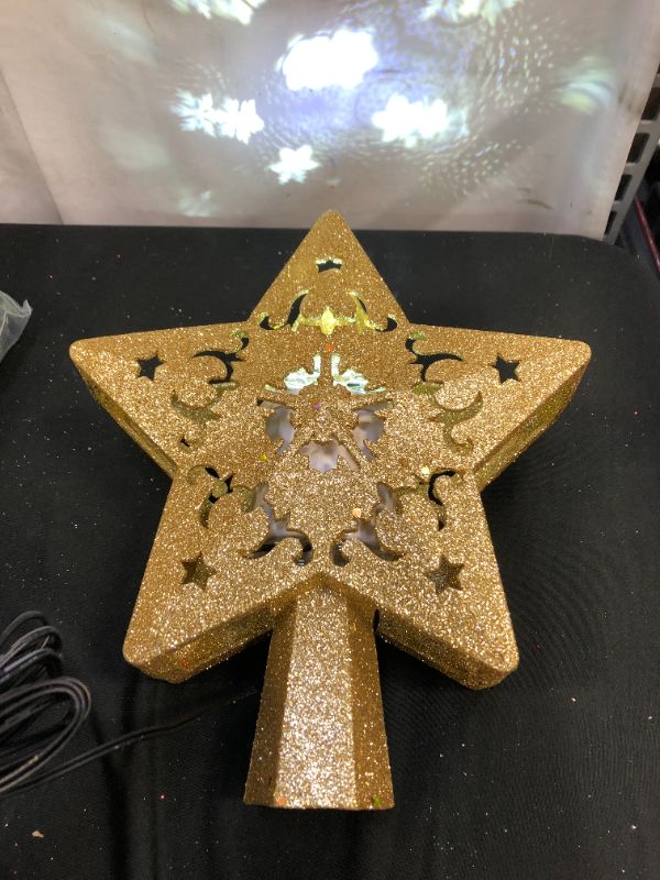 Photo 3 of ACMETOP Gold Star Christmas Tree Topper, Christmas Tree Star Topper with Rotating LED Snowflake Projector Light, Perfect for Christmas Tree Decoration, Home Decoration, Ideal Gifts (2021 Upgrade)