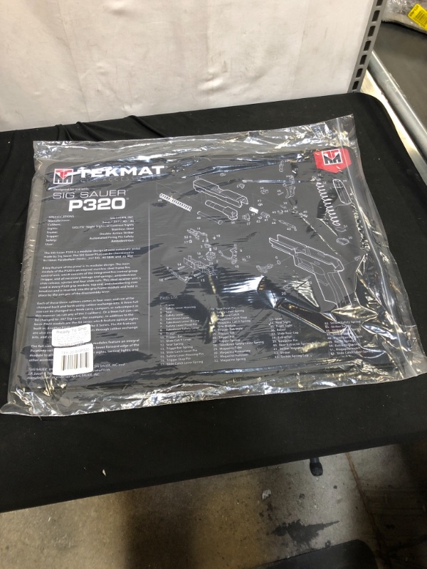 Photo 2 of TekMat Ultra Cleaning Mat for use with Sig P320 Black ,15" x 20"
