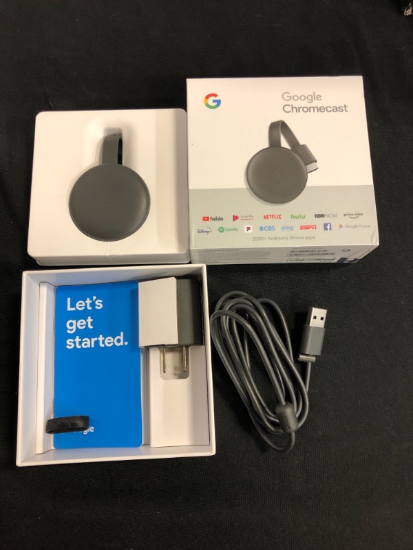 Photo 2 of Google Chromecast - Streaming Device with HDMI Cable - Stream Shows, Music, Photos, and Sports from Your Phone to Your TV
