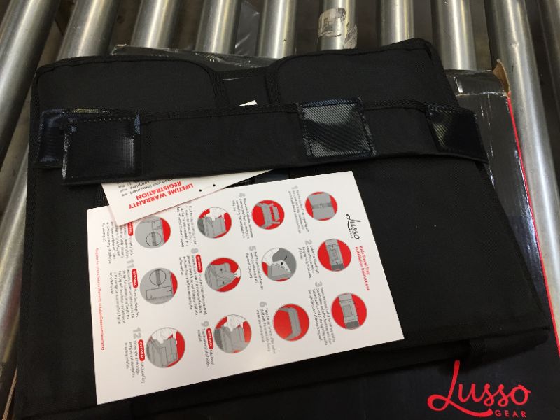 Photo 1 of Lusso Gear: Kids Travel Tray with Dry Erase Board, No Drop Tablet Holder, Travel Desk with Cup Holder, Storage Pockets for Snacks and Toys, Fits Airplane and Booster Seats (Black)
