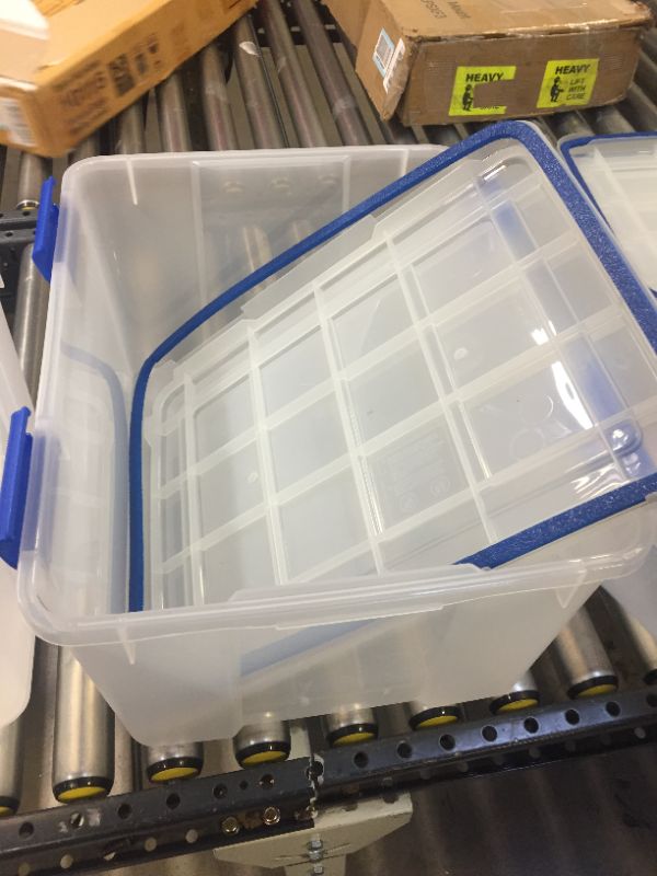 Photo 2 of CLEAR/ BLUE STORAGE CONTAINERS 19" X 15" 
4 ITEM BOUNDLE