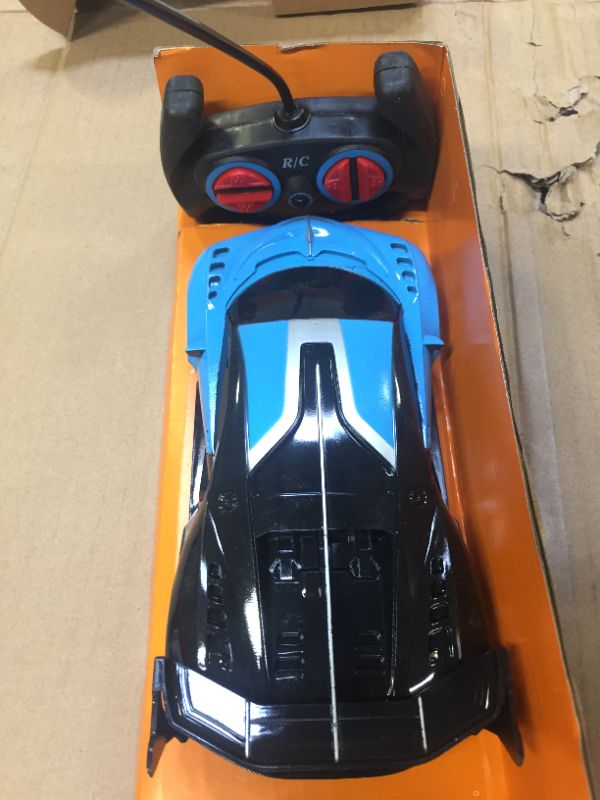 Photo 1 of high speed car 1.18 series remote control blue 27mhz
minor use