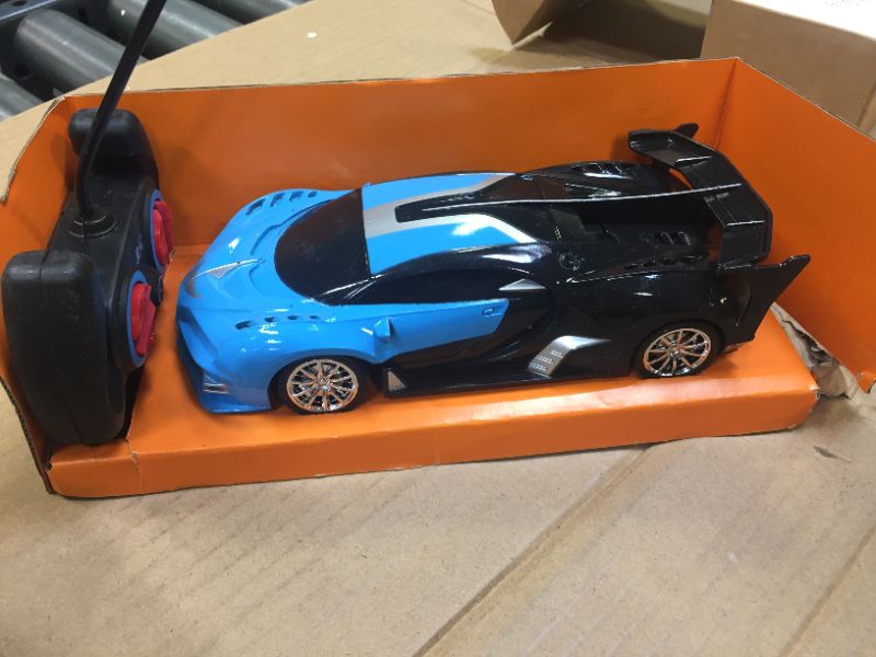 Photo 1 of high speed car 1.18 series remote control blue 27mhz
minor use