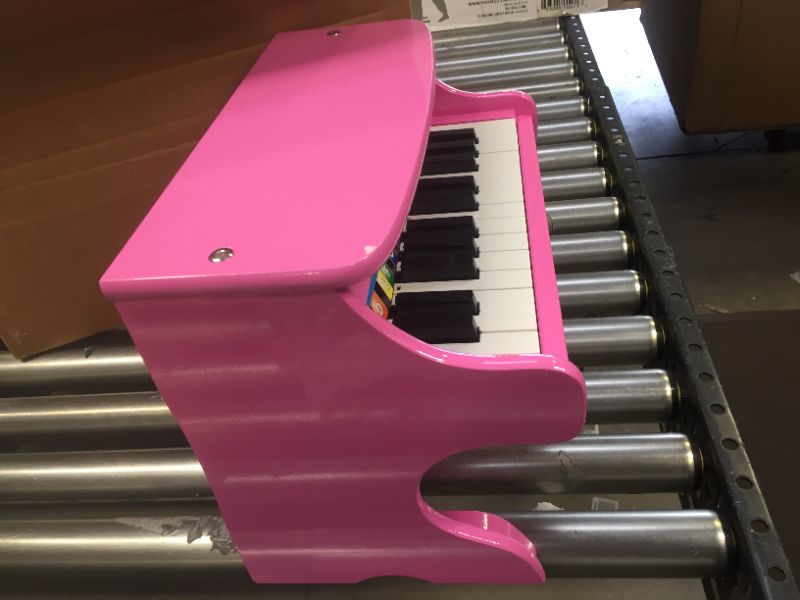 Photo 3 of Melissa & Doug Learn-to-Play Pink Piano With 25 Keys and Color-Coded Songbook
