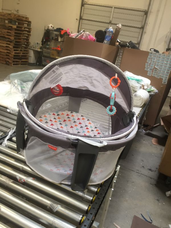 Photo 1 of fisher price bassinet