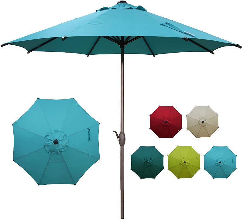 Photo 1 of Abba Patio 9ft Patio Umbrella Outdoor Market Table Umbrella with Push Button Tilt and Crank for Garden, Lawn, Deck, Backyard & Pool, 8 Sturdy Steel Ribs, Turquoise
