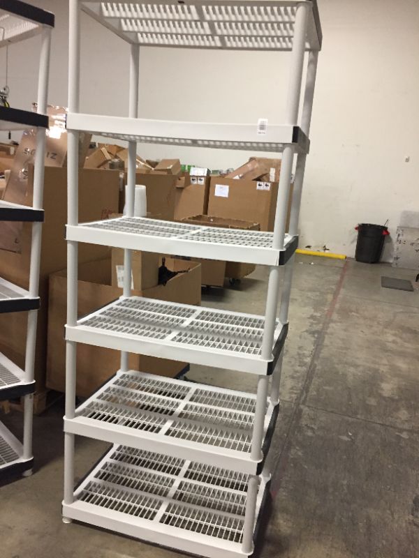 Photo 1 of 6 tier plastic shelves 24"x36" 