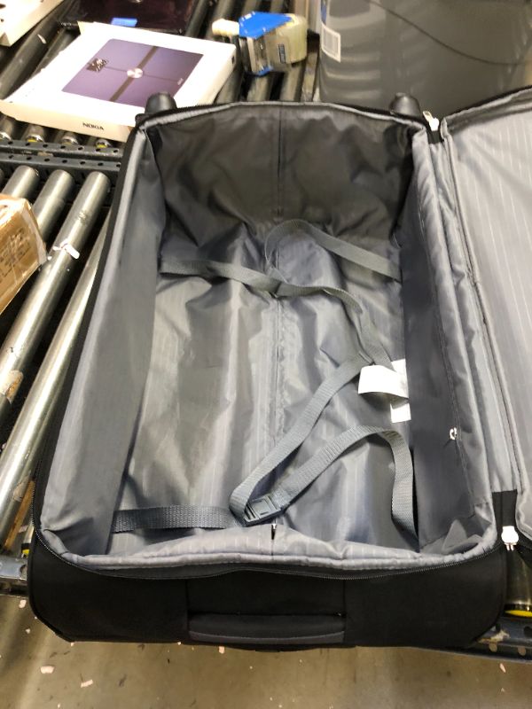 Photo 5 of Amazon Basics Expandable Softside Carry-On Spinner Luggage Suitcase With TSA Lock And Wheels - 23 Inch, Black

