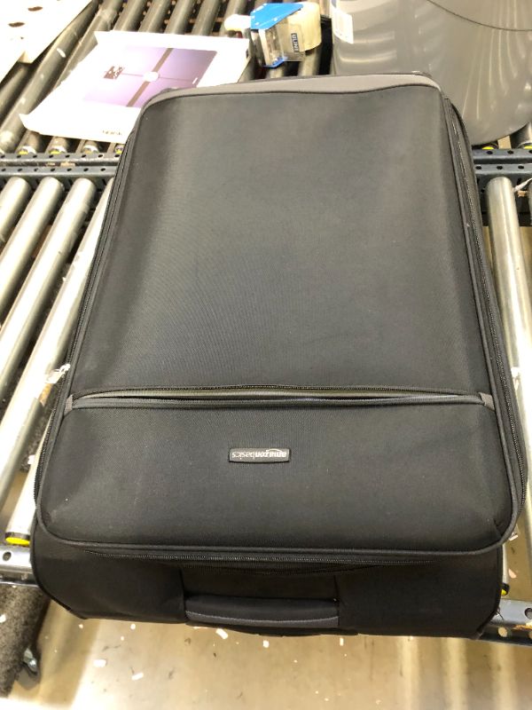 Photo 2 of Amazon Basics Expandable Softside Carry-On Spinner Luggage Suitcase With TSA Lock And Wheels - 23 Inch, Black
