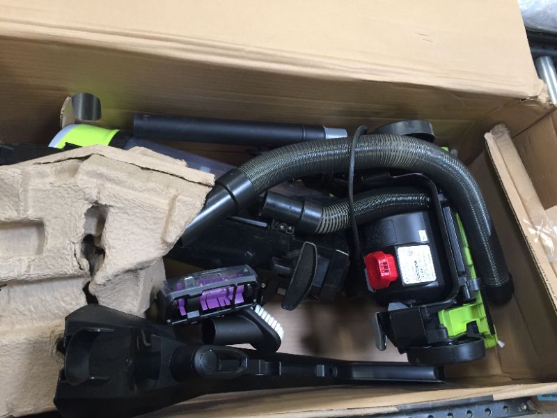 Photo 2 of BISSELL 2252 CleanView Swivel Upright Bagless Vacuum with Swivel Steering, Powerful Pet Hair Pick Up, Specialized Pet Tools, Large Capacity Dirt Tank, Easy Empty
(( OPEN BOX ))
** HAS TRASH INSIDE BIN **