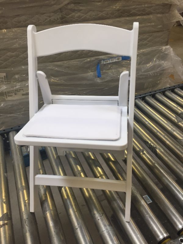 Photo 2 of Flash Furniture Kids White Resin Folding Chair with White Vinyl Padded Seat
