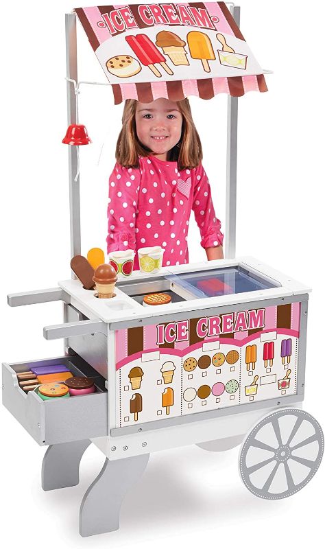 Photo 1 of Melissa & Doug Wooden Snacks and Sweets Food Cart - 40+ Play Food pcs, Reversible Awning
