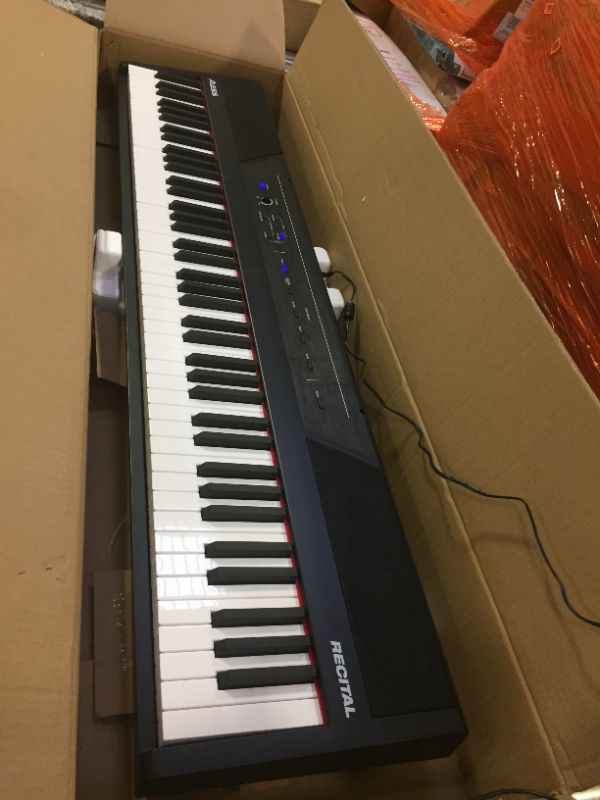 Photo 3 of Alesis Recital – 88 Key Digital Piano Keyboard with Semi Weighted Keys, 2x20W Speakers, 5 Voices, Split, Layer and Lesson Mode, FX and Piano Lessons
