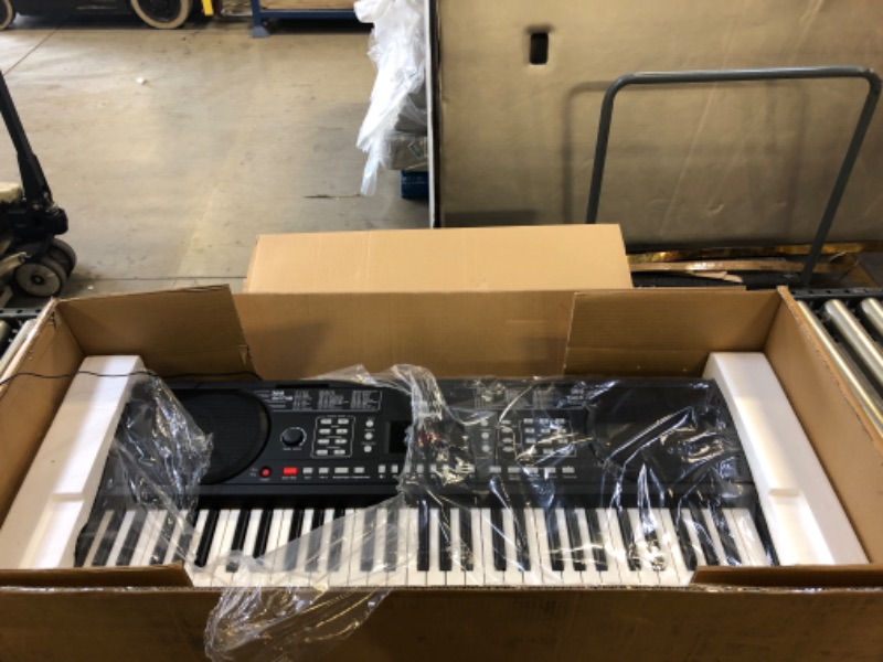 Photo 1 of Moukey Keyboard Piano, 61 Key Piano Keyboard, Full-Size Electric Piano, Superior Sound and Powerful Functions, Electric Keyboard with Digital Piano Stand, Music Stand, Bench and Headphones
