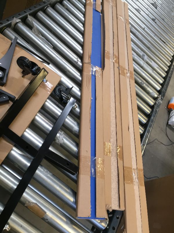 Photo 7 of JOOLA Inside - Professional MDF Indoor Table Tennis Table with Quick Clamp Ping Pong Net and Post Set - 10 Minute Easy Assembly - Ping Pong Table with Single Player Playback Mode
corner damage
