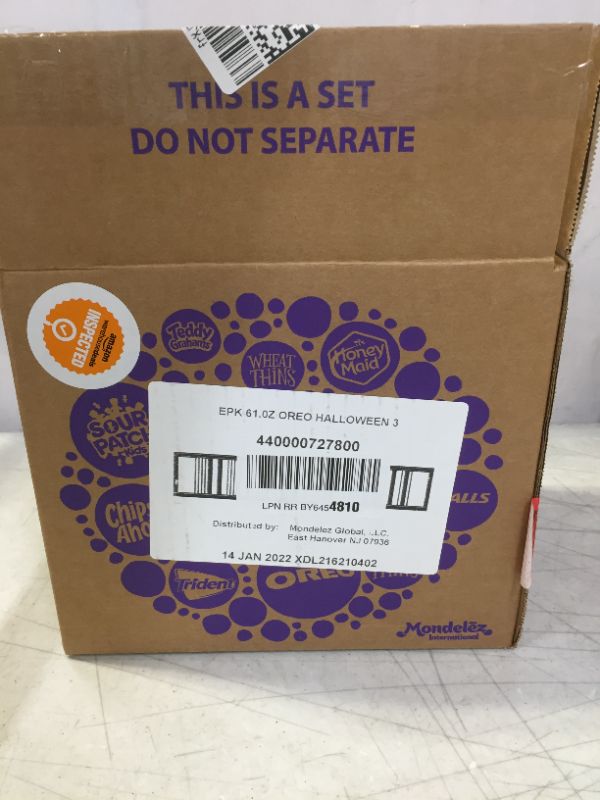 Photo 2 of OREO Orange Creme Halloween Chocolate Sandwich Cookies, 3 - 1.25 lb Packs + Bonus OREO Mini Chocolate Sandwich Cookies Snack Pack, Halloween Cookies best by 14 JAN 2022