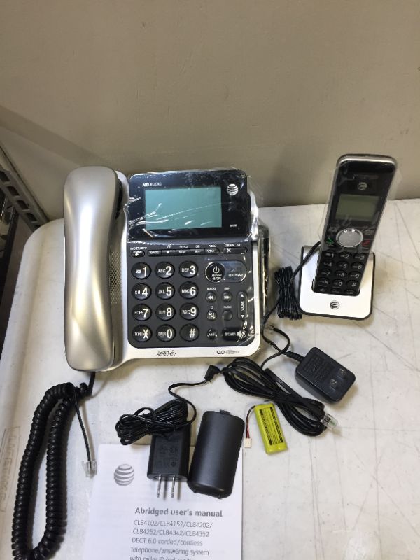 Photo 2 of At&T CL84102 DECT 6.0 Expandable Corded/Cordless Phone with Answering System and Caller ID/Call Waiting, 1 Corded and 1 Cordless Handset,Silver.