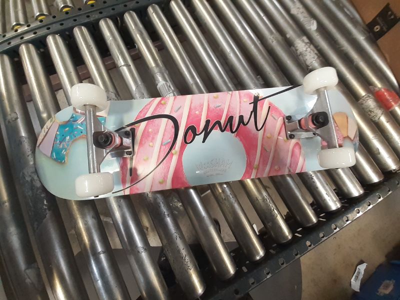 Photo 1 of skateboard -- with donut print in the board 