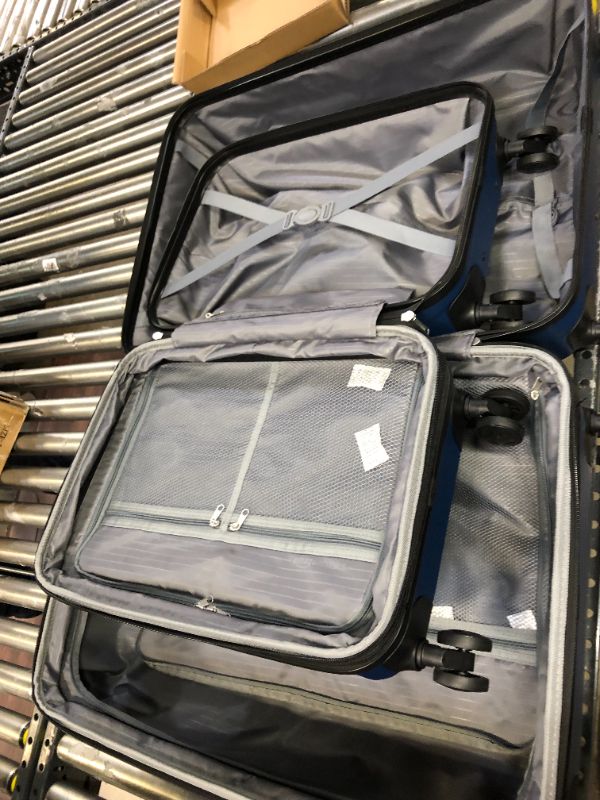 Photo 1 of Amazon Basics 2-Piece Set Hardside Spinner, Navy Blue (B074MDKZM7)