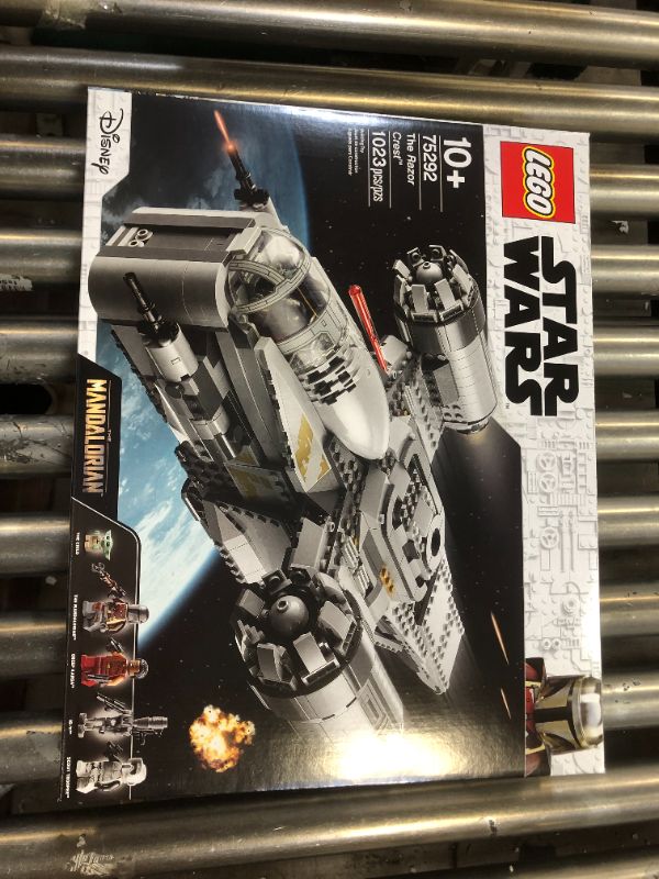 Photo 2 of LEGO Star Wars: The Mandalorian The Razor Crest 75292 Exclusive Building Kit, New 2020 (1,023 Pieces)